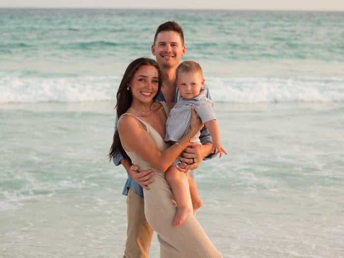 Annie Boyd Sowell, her husband, and son on the beach